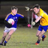 Longford's Darragh Doherty takes on his Roscommon opponent Mark Richardson during Friday's Hastings Cup U21 Tournament match in McGann Park, Kenagh. Photo by Declan Gilmore