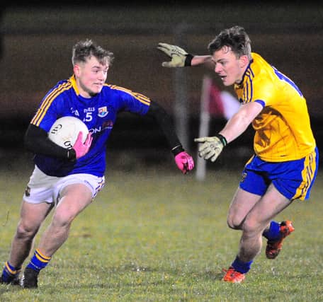 Longford's Darragh Doherty takes on his Roscommon opponent Mark Richardson during Friday's Hastings Cup U21 Tournament match in McGann Park, Kenagh. Photo by Declan Gilmore