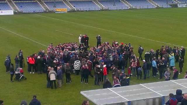 Mullinalaghta celebrate on the pitch after their victory.