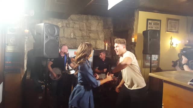 Curtis whirls Maura around the dancefloor at Skelly's Bar, Ballymahon