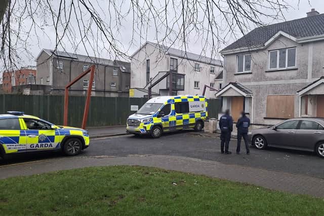 FEBRUARY 5 2026: Wooden panels being installed on the houses last February under Garda surveillance