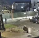 A man has been arrested for questioning in connection with a shooting that took place in Garvey's Close last February