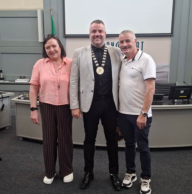 The newly elected Cathaoirleach with his proud parents Kevin Snr and Sandra Hussey