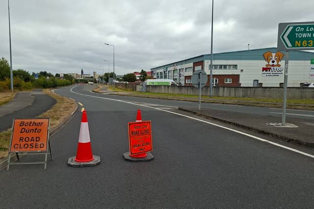 To facilitate emergency work on a burst water main, this section of the Athlone Road was closed this morning, with only local access allowed.
