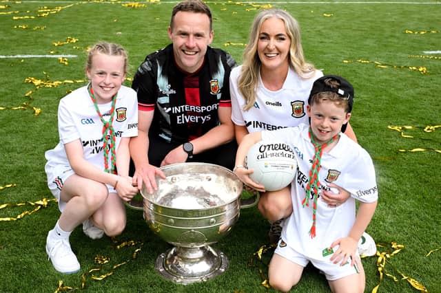 U-21 Enda McGuill Cup medal with Longford Town FC in 2001 and Mayo manager Andy Moran with the Sam Maguire Cup, his wife Jennifer, and children Charlotte and Ollie