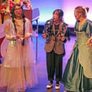 Fairy Godmother Margel Juyogon, Carrie Clipboard Eily Patrice Juyogon and Cinderella Emile Valatkaite in the Backstage Youth Theatre annual panto production entitled 'The Spare Prince', an original Cinderella-themed panto written by Brendan Williams, and staged in January 2026 