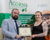 Brónagh Rogers of Bean & Bread receiving her certificate for completing the ACORNS programme from Peter Johnston, Department of Agriculture, Food and the Marine.