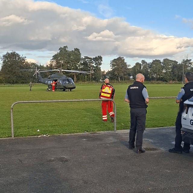 Paramedics return to the Air Corps helicopter following the emergency.  
