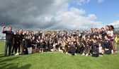 The Ballymore squad, mentors and young family members celebrate the success in the Ladies Football Intermediate Championship Final on Saturday  Photo: Syl Healy 
