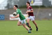 Liam Sheridan on the attack for Clonguish ahead of Kenagh opponent Ollie Manser. Action from the JFC ‘A’ semi-final on Saturday Photo: Syl Healy 