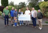 Club Longford members Mark Connellan, Longford GAA Chairperson Derek Fahy, Brendan McLoughlin, Club Longford Chairperson Derek Sheridan and  Cllr Martin Skelly present the prize winning cheque of €50,000 to lucky winners Johnny, Ann, JJ and Baby Shea Keegan, Carrickedmond.