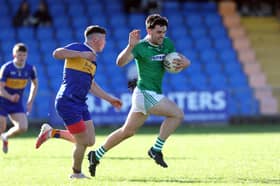 Matthew Carey on the attack for Clonguish in evading the challenge of Dromard opponent Ronan Corcoran. Action from the SFC semi-final Photo: Syl Healy 