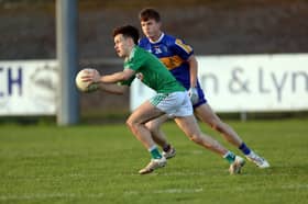 Cormac Flynn on the attack for Clonguish in his bid to evade the challenge of Dromard opponent Padraig Mulligan. Action from the Senior Football Championship semi-final replay Photo: Syl Healy 