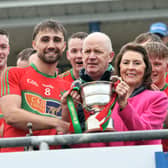 Mostrim captain Jack Belton receiving the Gerry Hennessy Cup from Anne Hennessy and Longford GAA Chairperson Derek Fahy. The Edgeworthstown club overcame Sean Connolly’s on a 1-17 to 1-11 scoreline in the Intermediate Football Championship Final at Glennon Brothers Pearse Park on Sunday last   Photo: Syl Healy 