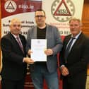 Hans Hoofdmann (Drumlish, Co Longford and Nua Healthcare services, Naas Co Kildare) receiving his NISO Health and Safety Cert in the Hodson Bay Hotel recently from Minister Kevin Boxer Moran and Sean Reidy (TUS Athlone and NISO Midlands Chairperson.) 