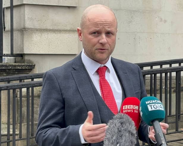 Loyalist activist Jamie Bryson speaks outside court