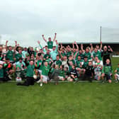 The jubilant Clonguish junior football squad, mentors and family members celebrate the dramatic win over Ballymore in the ‘A’ championship final Photo: Syl Healy