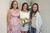Tona Clabby pictured on her wedding day with her daughters Abbey and Grace​