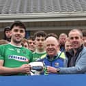 Clonguish captain Matthew Carey receiving the Sean Connolly Cup from David Hanley  (sponsor, Peter Hanley Motors) and Longford GAA Chairperson Derek Fahy Photo: Syl Healy 