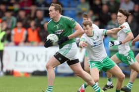 Peter Hanley on the ball for Clonguish in breaking away from Killoe opponent Ronan McGoldrick. Action from the Senior Football Championship Final at Glennon Brothers Pearse Park on Sunday last   Photo: Syl Healy 