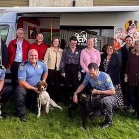 Evelyn and Enda Neary of Longford based charity, Cian’s Kennels, pictured with members of An Garda Síochána and hospital staff