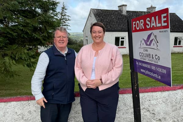 ​Longford auctioneer John Columb pictured with presenter of RTÉ’s Cheap Irish Homes, Maggie Molloy
