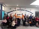 St Christopher's Special School students pictured celebrating their fantastic fundraising achievement for the Jack and Jill Children's Foundation
