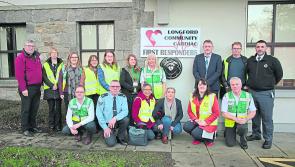 Longford Cardiac First Responders install  defibrillator at Longford Garda Station