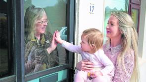 ‘Mother’s Day highlights the distance’ as Longford child visits granny through a window pane