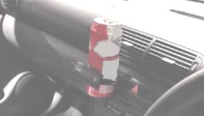 New use for coffee holder! No wonder driver tried to hide on Garda&iacute;