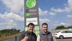 Hot offer - Massive queues form as motorists flock to filliing stations for cut price fuel as part of birthday celebrations
