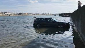 Motorists in tourist hotspot get that sinking feeling as tide comes in