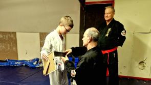 Against all odds brave Longford teen Jonatan Safiak achieves his karate Black Belt