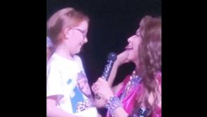 Let's go girls: 8-year-old sings on stage with Shania Twain 