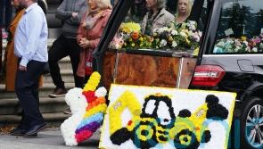 Woman charged over deaths of two children in car fire