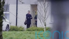 Dismissed Midlands teacher stands outside school for a second day