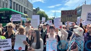 Protesters gather in cities in solidarity with woman left unconscious by soldier