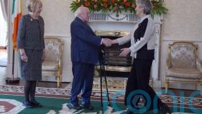 Hugs and handshakes as Ireland’s President welcomes his successor