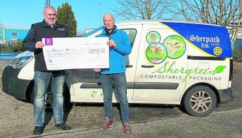 Sponsor Derek Sheridan of  Sherpack Ltd presenting a €5,000 donation to Brendan Considine for the Malin to Mizen Cycle
