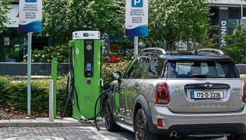 How many electric cars were sold in Longford last year?