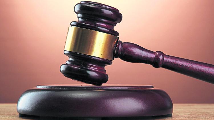 Garda&iacute; detected drunk driver when he 'released handbrake causing the vehicle to roll back'