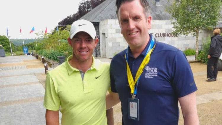 Chartered physiotherapist, Barry Mollaghan with double Masters winner Rory McIlroy
