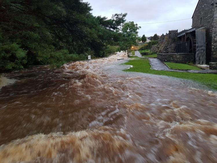 WATCH Dramatic footage of banks bursting at Mill river in Drumlish as