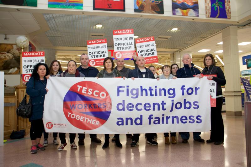 Tesco row ratchets up as staff down tools