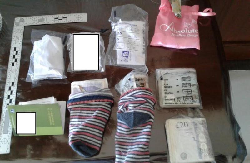 BREAKING: CAB find money in socks as £1,500 sterling and documentation seized at Longford town property