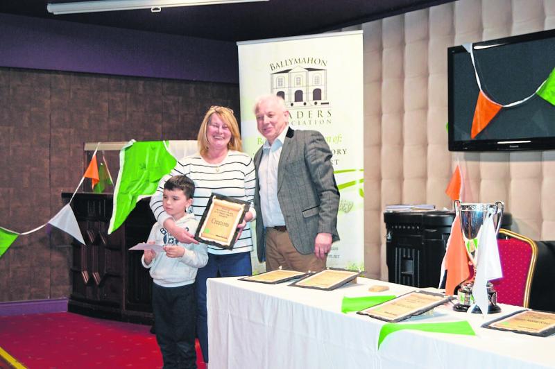 Mary Lennon of Creations Garden Centre picks up her prize for Best Window Display for the Ballymahon St Patrick's Day parade
