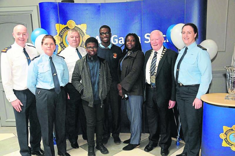 Eric is pictured with family members and Longford / Roscommon Chief Superintendent Tony Healy, Inspector Blaithín Moran and Supterintendent Jim Delaney