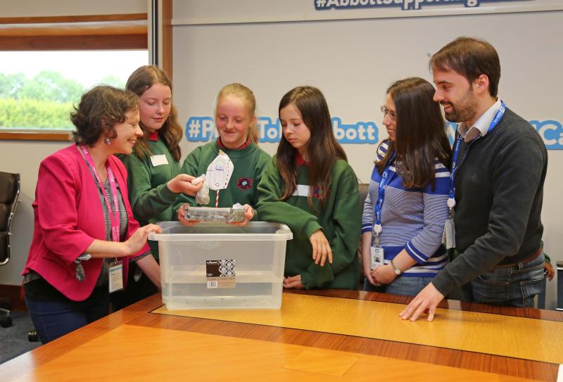 Pupils from St John's NS working on their “Engineering-in-a-Box Boat Building Challenge” with Abbott engineers (on right)  Dr. Alice D'Arcy of STEAM. Picture - Shelley Corcoran