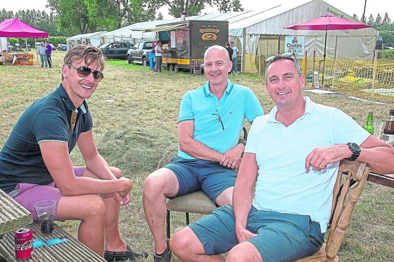 Enjoying last years successful show were Will O'Carroll, Oliver Plunkett (land owner) and Eoin Lawry Pictures: Michelle Ghee