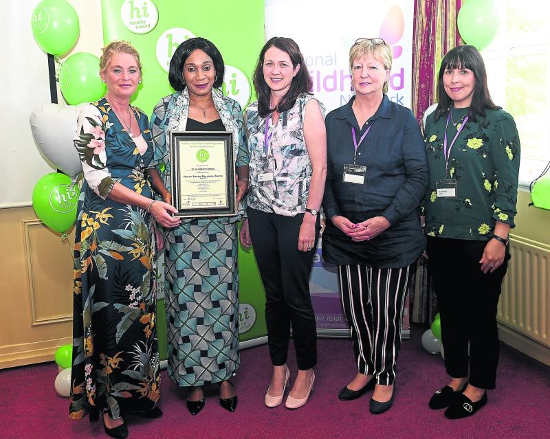 At the presentation of the National Healthy Ireland award to Harmony House Community Centre: Tir na nÓg preschool were Geraldine McKeon (staff member), Olabisi Ogunsakin (centre manager), Orla McGowan